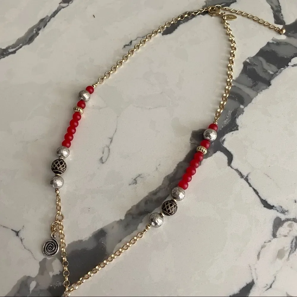 Chico’s long Kira gold tone charm necklace